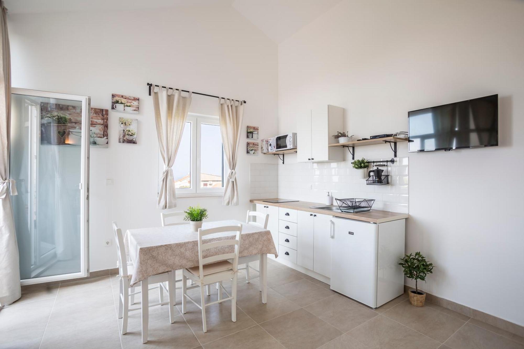 Apartmani Mariela Maslinica Bilik gambar